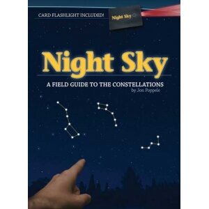 Night sky field guide book that comes with a small flashlight.