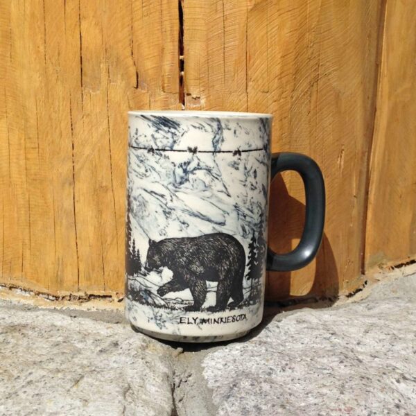 Sketch bear walking scene on a mug.